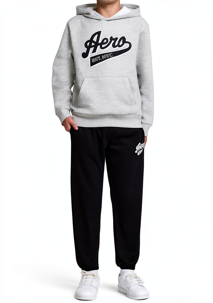 Child wearing Aeropostale Boys Athletic Pants and Hoodie Set on a school playground